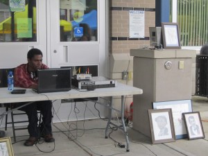 Fine artist and DJ Derrick "Vito" Hollowell has shown his art as part of the market's grand opening celebrations the past two years.